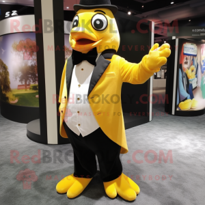 Yellow Penguin mascot costume character dressed with a Dress Pants and Cufflinks