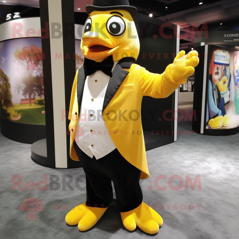 Yellow Penguin mascot costume character dressed with a Dress Pants and Cufflinks