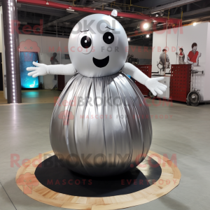 Silver Human Cannon Ball mascot costume character dressed with a Maxi Skirt and Foot pads