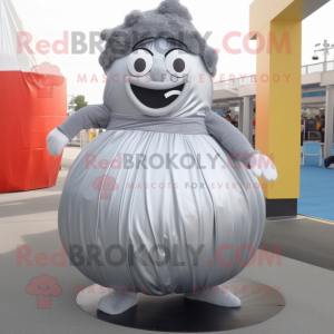 Silver Human Cannon Ball mascot costume character dressed with a Maxi Skirt and Foot pads