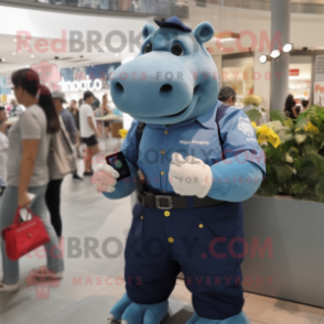 Navy Hippopotamus mascot costume character dressed with a Denim Shorts and Smartwatches