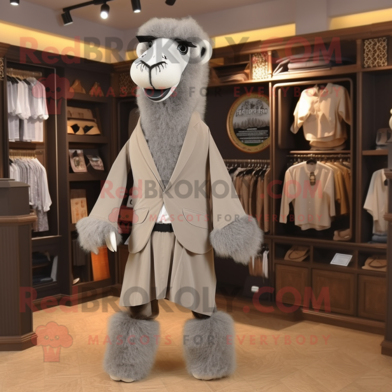 Gray Camel mascot costume character dressed with a Suit Pants and Shawl pins