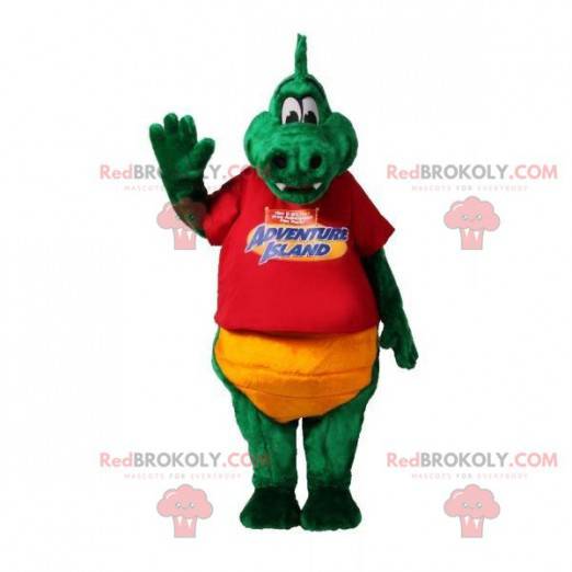Mascote crocodilo verde e amarelo suave e divertido -