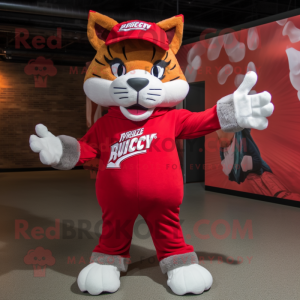 Red Bobcat mascot costume character dressed with a Long Sleeve Tee and Beanies