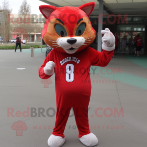 Red Bobcat mascot costume character dressed with a Long Sleeve Tee and Beanies