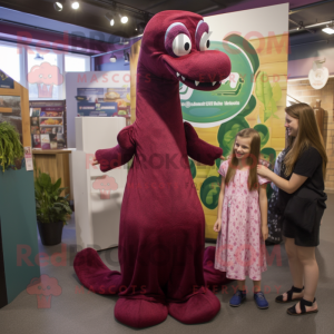 Maroon Loch Ness Monster mascot costume character dressed with a Empire Waist Dress and Hair clips