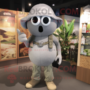 Gray Pepper mascot costume character dressed with a Cargo Shorts and Hats