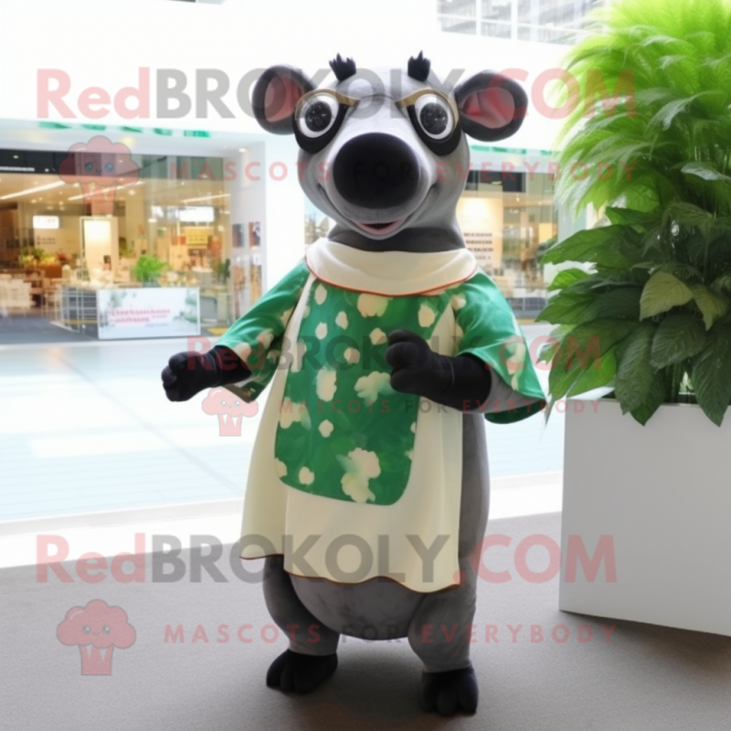 Olive Tapir mascot costume character dressed with a Dress and Reading glasses