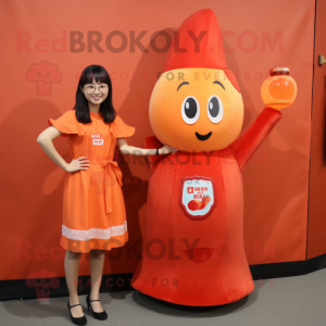 Peach Bottle Of Ketchup mascot costume character dressed with a A-Line Skirt and Wallets