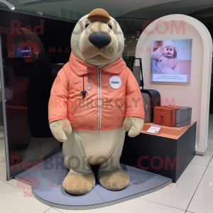 Peach Walrus mascot costume character dressed with a Bomber Jacket and Keychains
