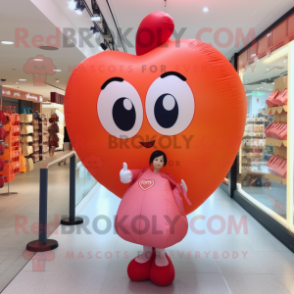 Peach Heart Shaped Balloons mascot costume character dressed with a Mini Dress and Tote bags