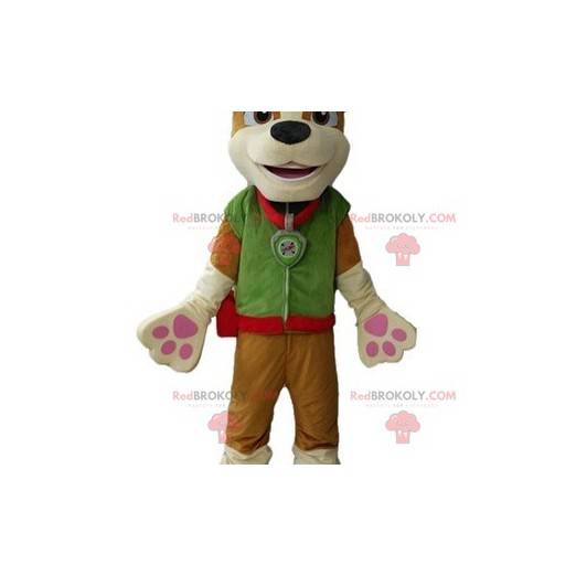 Mascotte cane marrone vestito con un abito verde -