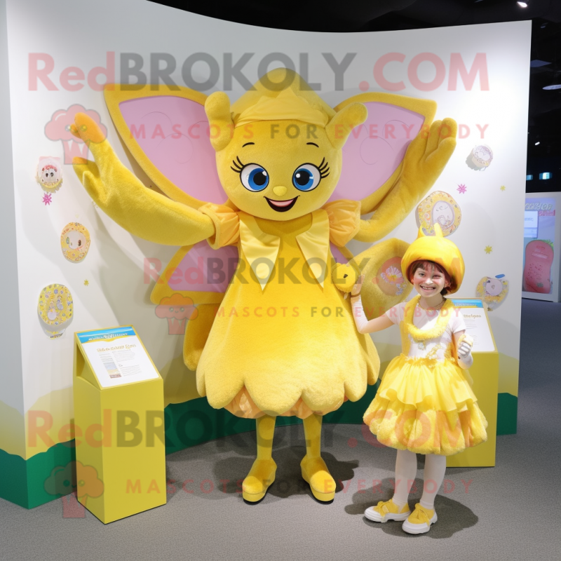 Yellow Tooth Fairy mascot costume character dressed with a Blouse and Coin purses Yellow Tooth Fairy mascot costume character dressed with a Blouse and Coin purses