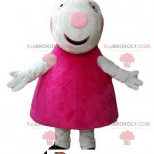 Mascota de cerdo blanco vestida con un vestido rosa -