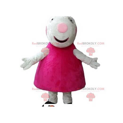 Mascota de cerdo blanco vestida con un vestido rosa -
