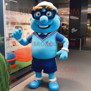 Blue Aglet mascot costume character dressed with a Rugby Shirt and Eyeglasses