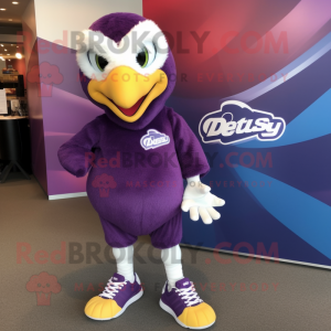 Purple Eagle mascot costume character dressed with a Bikini and Shoe clips