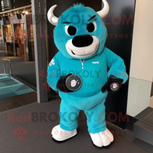 Turquoise Buffalo mascot costume character dressed with a Jumpsuit and Smartwatches