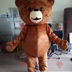 Mascota de oso de peluche marrón regordeta y conmovedora -