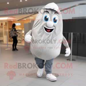 Silver Potato mascot costume character dressed with a Jeans and Shoe laces