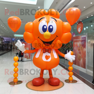 Orange Heart Shaped Balloons mascot costume character dressed with a Dress and Bracelet watches