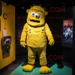 Yellow Frankenstein'S Monster mascot costume character dressed with a Dungarees and Hairpins