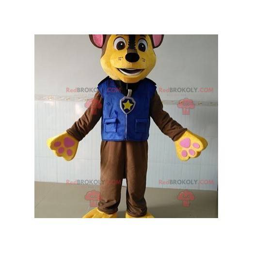 Mascotte cane marrone e giallo vestito da poliziotto -