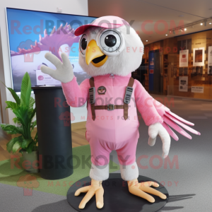 Pink Falcon mascot costume character dressed with a Dungarees and Shoe clips