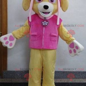 Mascotte de chien beige avec une tenue rose - Redbrokoly.com