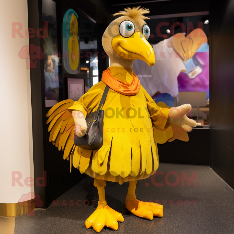 Gold Dodo Bird mascot costume character dressed with a Skirt and Handbags Gold Dodo Bird mascot costume character dressed with a Skirt and Handbags