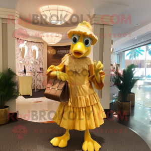 Gold Dodo Bird mascot costume character dressed with a Skirt and Handbags