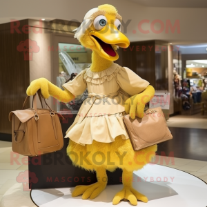 Gold Dodo Bird mascot costume character dressed with a Skirt and Handbags