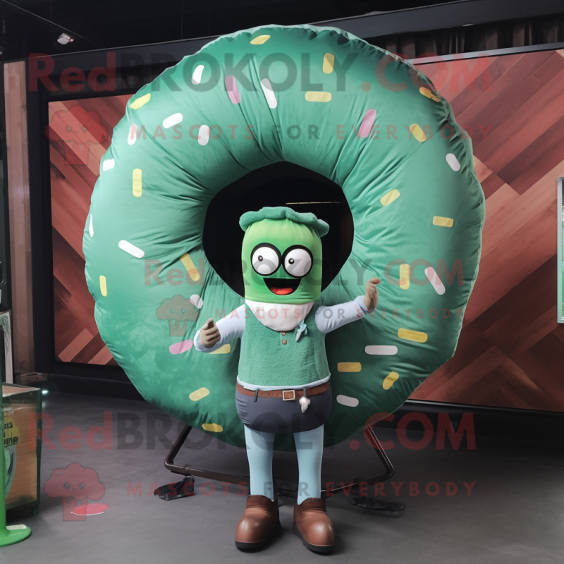 Forest Green Donut mascot costume character dressed with a Denim Shorts and Shawls