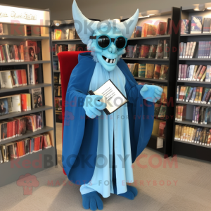 Sky Blue Vampire mascot costume character dressed with a Cover-up and Reading glasses