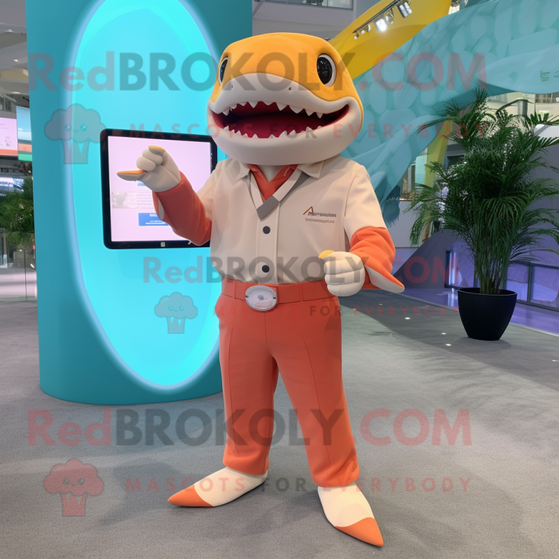 Peach Shark mascot costume character dressed with a Button-Up Shirt and Smartwatches