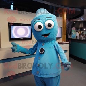 Turquoise Television mascot costume character dressed with a Oxford Shirt and Shawl pins