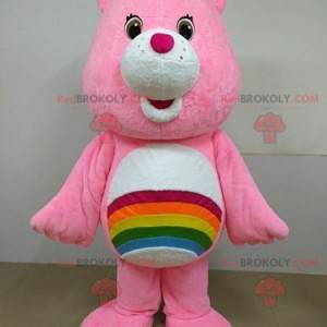 Mascotte de Bisounours rose avec un arc-en-ciel - Redbrokoly.com