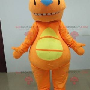 Mascotte de dinosaure orange et jaune. Costume orange -