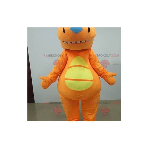 Mascote de dinossauro laranja e amarelo. Terno laranja -