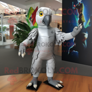 Silver Parrot mascot costume character dressed with a Rash Guard and Foot pads