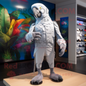 Silver Parrot mascot costume character dressed with a Rash Guard and Foot pads