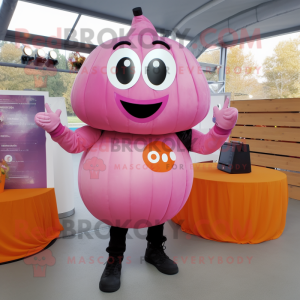 Pink Pumpkin mascot costume character dressed with a Oxford Shirt and Rings