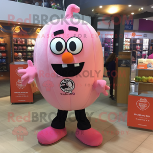 Pink Pumpkin mascot costume character dressed with a Oxford Shirt and Rings