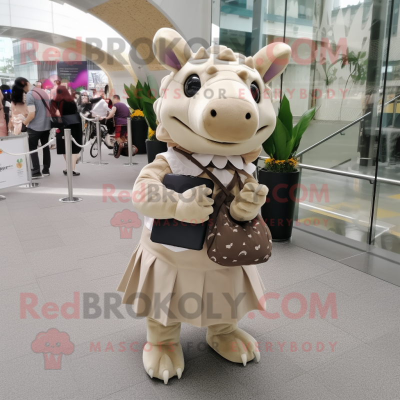 Beige Triceratops mascot costume character dressed with a Midi Dress and Messenger bags Beige Triceratops mascot costume character dressed with a Midi Dress and Messenger bags