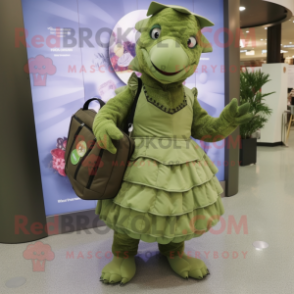 Olive Pangolin mascot costume character dressed with a Midi Dress and Messenger bags