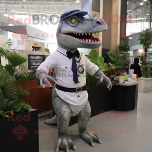 Gray Tyrannosaurus mascot costume character dressed with a Poplin Shirt and Brooches