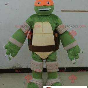 Mascota de la tortuga ninja con una diadema naranja -