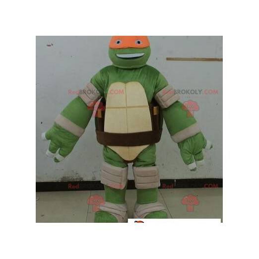 Ninja Turtle Maskottchen mit einem orangefarbenen Stirnband -