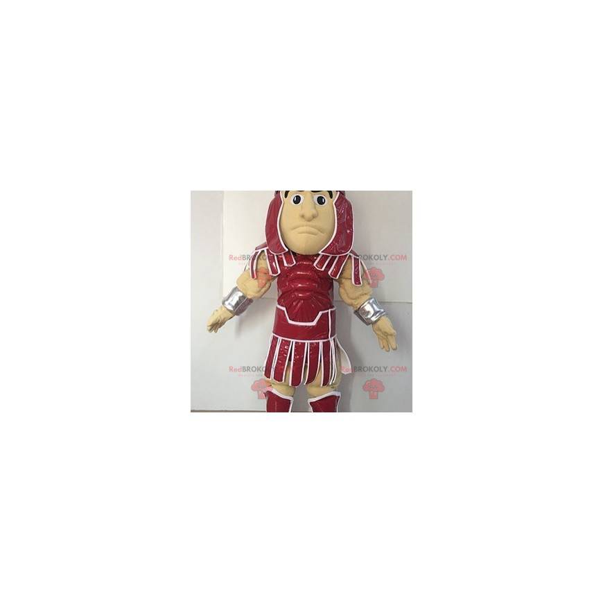 Mascote do gladiador vestido com uma roupa vermelha -