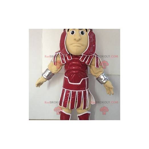 Gladiator maskot klædt i et rødt tøj - Redbrokoly.com